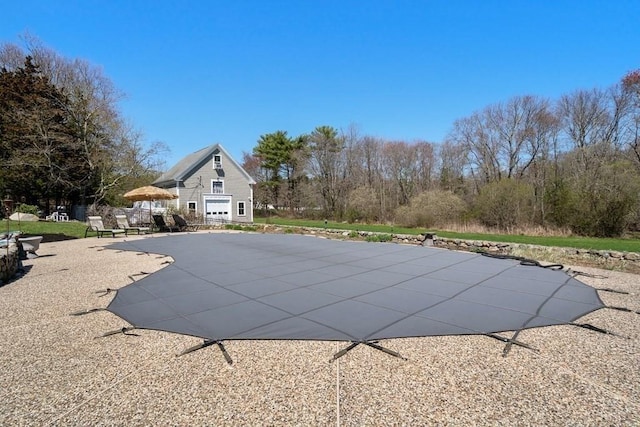 619 Main St, Hanover, MA 02339 - view of swimming pool featuring a patio area and a covered pool