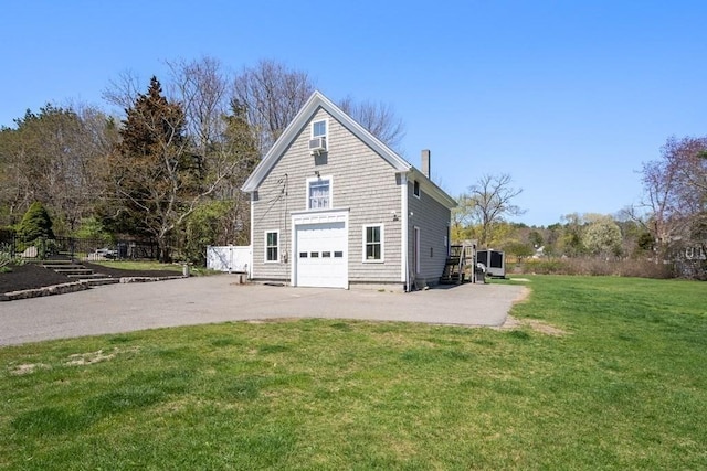 619 Main St, Hanover, MA 02339 - view of side of home featuring a lawn, driveway, and a chimney