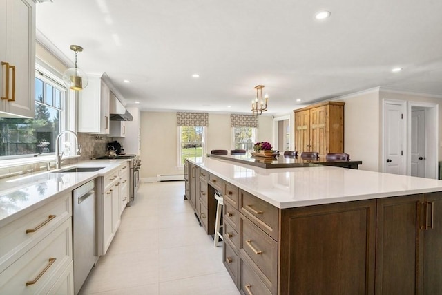 619 Main St, Hanover, MA 02339 - kitchen with a sink, appliances with stainless steel finishes, recessed lighting, a large island, and light countertops