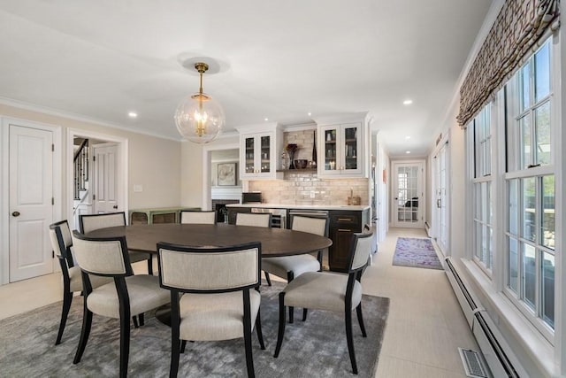 619 Main St, Hanover, MA 02339 - dining area featuring a chandelier, ornamental molding, a baseboard heating unit, recessed lighting, and stairway