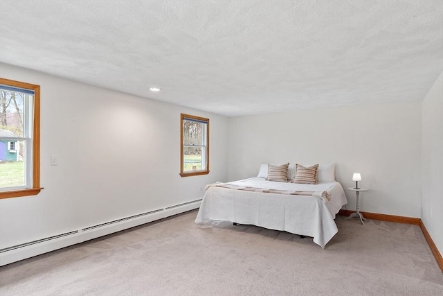 bedroom with a textured ceiling, light colored carpet, baseboard heating, baseboards, and recessed lighting