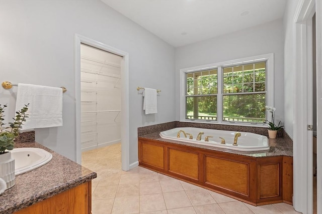 26 Sam Cobb Ln, Princeton, MA 01541 - bathroom featuring a bath, vanity, tile patterned floors, and a spacious closet