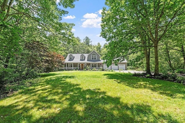 26 Sam Cobb Ln, Princeton, MA 01541 - view of green lawn featuring an attached garage, covered porch, and driveway