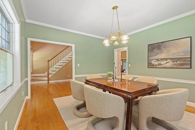 26 Sam Cobb Ln, Princeton, MA 01541 - dining area with wood finished floors, stairway, ornamental molding, and a chandelier