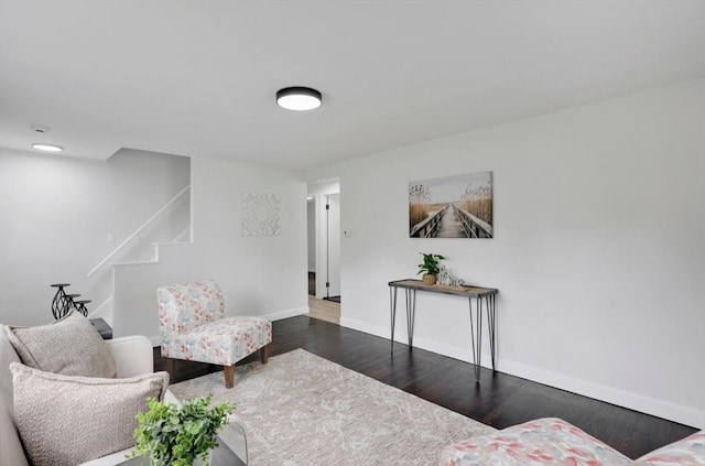 69 Notre Dame St, Springfield, MA 01104 - living room with wood finished floors, baseboards, and stairway