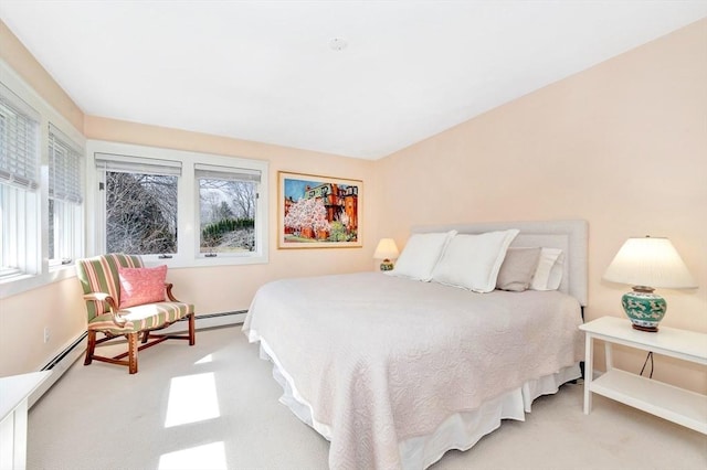 bedroom with light colored carpet and multiple windows