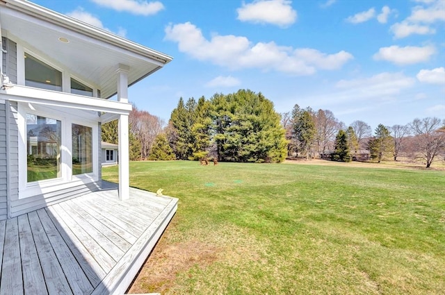 view of yard featuring a deck