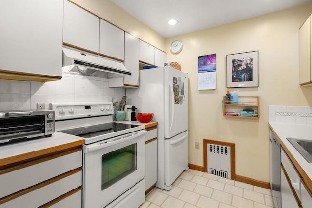 27 5th Ave Unit 27, Watertown, MA 02472 - kitchen with under cabinet range hood, white appliances, radiator heating unit, backsplash, and light countertops