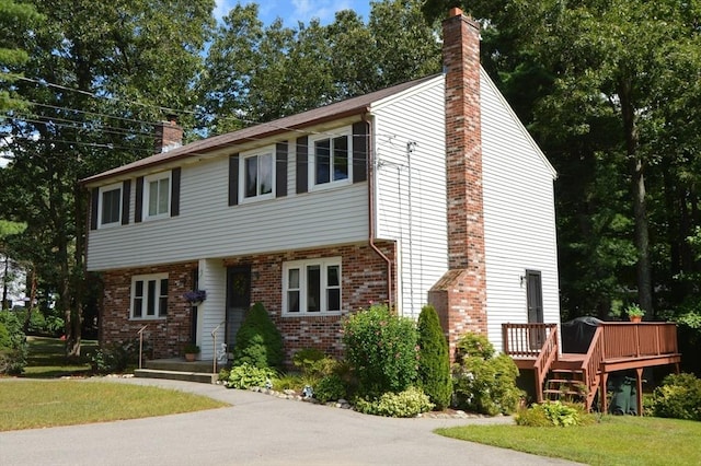 view of front of home with a wooden deck