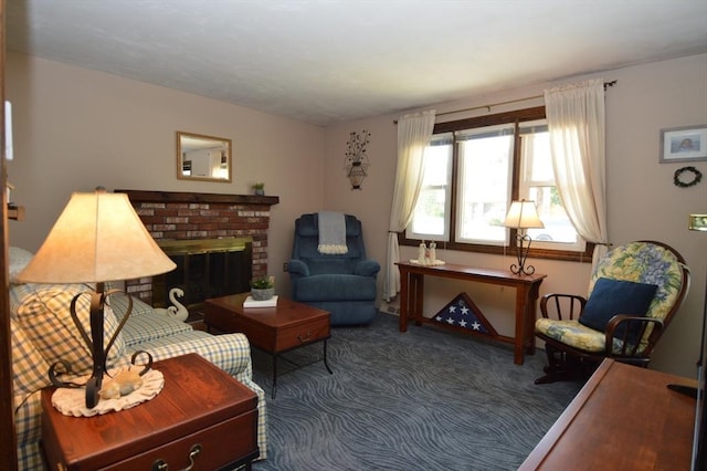 sitting room with carpet floors and a fireplace