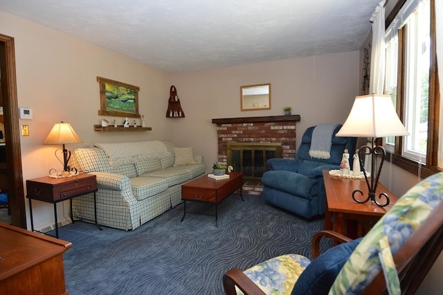 living room with a fireplace and carpet