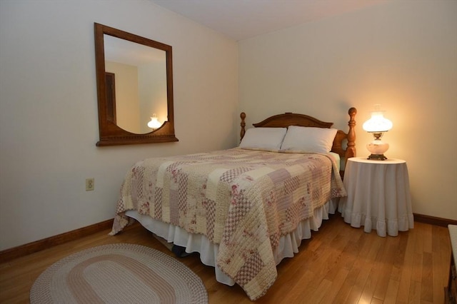 bedroom featuring light wood-type flooring