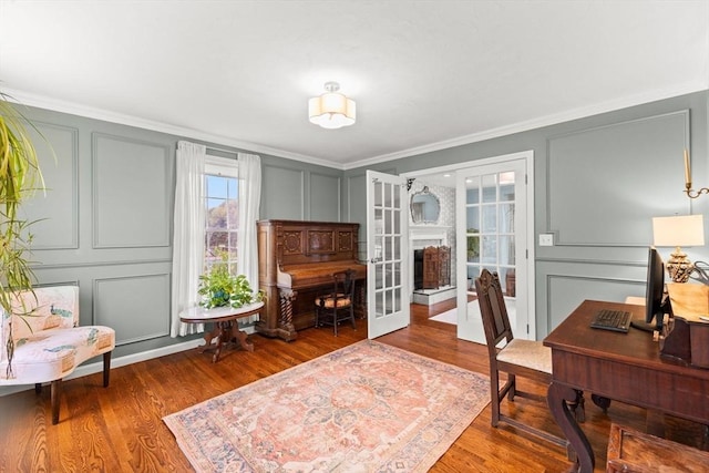42 Britton St, Raynham, MA 02767 - office area with a decorative wall, ornamental molding, and wood finished floors