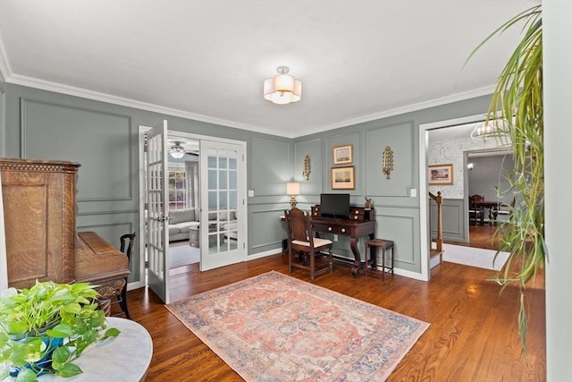 42 Britton St, Raynham, MA 02767 - office area featuring french doors, a decorative wall, ornamental molding, wood finished floors, and a ceiling fan