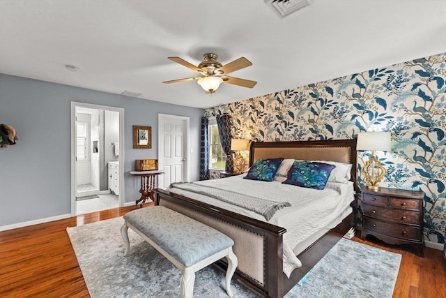 42 Britton St, Raynham, MA 02767 - bedroom featuring wallpapered walls, baseboards, wood finished floors, ensuite bathroom, and a ceiling fan