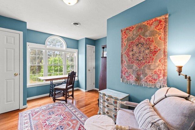 42 Britton St, Raynham, MA 02767 - living area with wood finished floors and baseboards