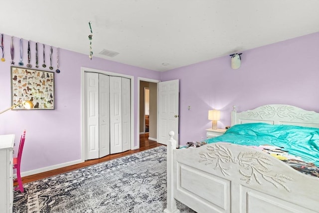 42 Britton St, Raynham, MA 02767 - bedroom featuring wood finished floors, baseboards, and a closet