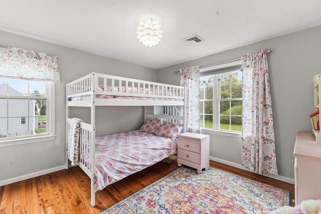 42 Britton St, Raynham, MA 02767 - bedroom with wood finished floors and baseboards