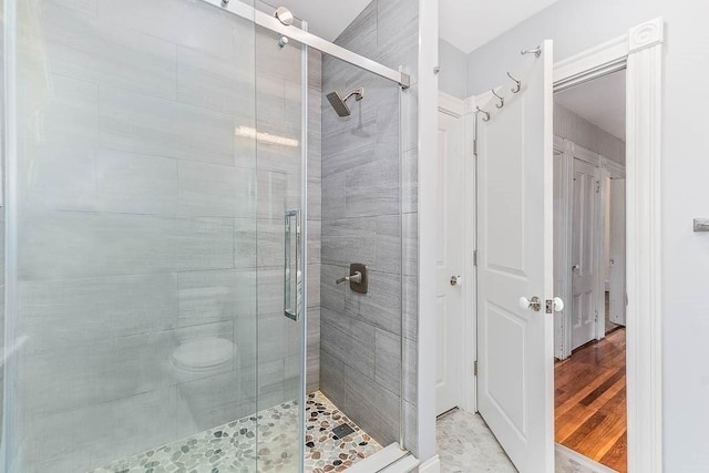 full bathroom featuring a stall shower