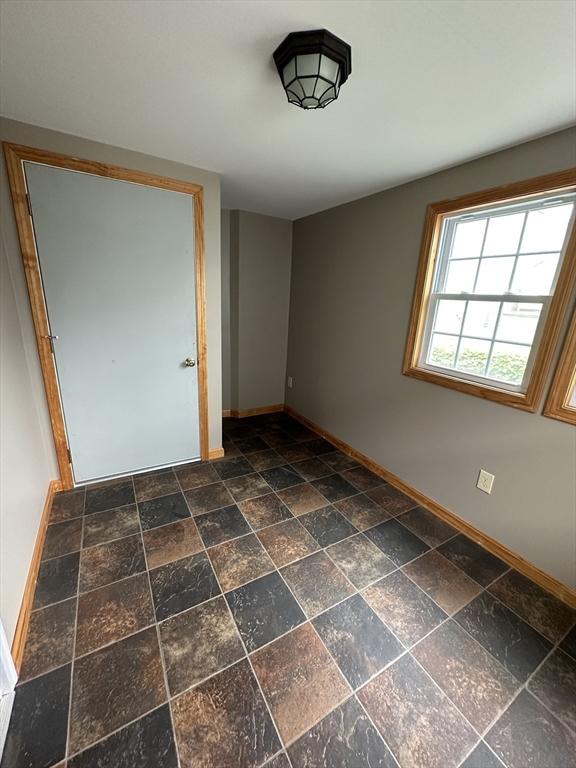 50 Keene St, Lowell, MA 01852 - unfurnished room featuring baseboards