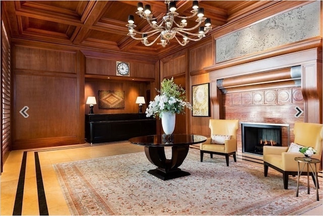 living area featuring wood ceiling, beamed ceiling, a notable chandelier, wood walls, and coffered ceiling