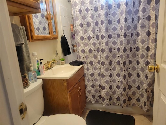 bathroom with vanity, toilet, and a shower with shower curtain