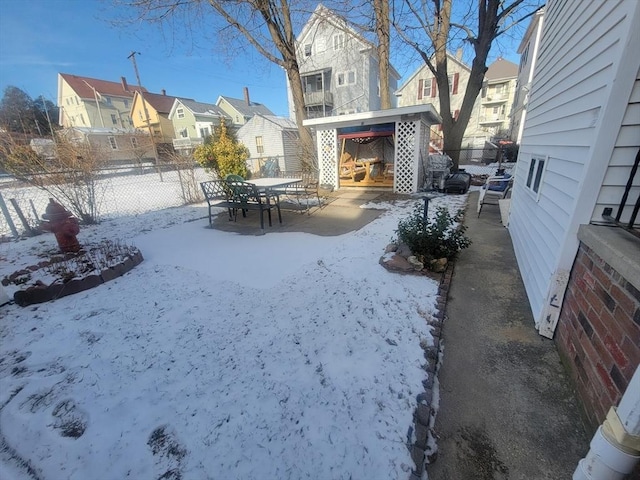 view of yard covered in snow