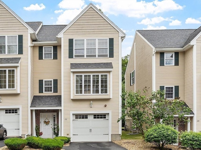 22 Marengo St Unit 22, North Andover, MA 01845 - view of front facade with a garage and driveway