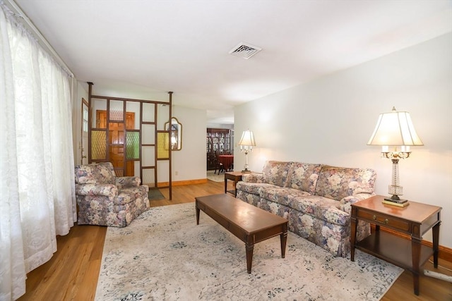 40 Old Stage Rd, Chelmsford, MA 01824 - living room featuring wood finished floors and baseboards
