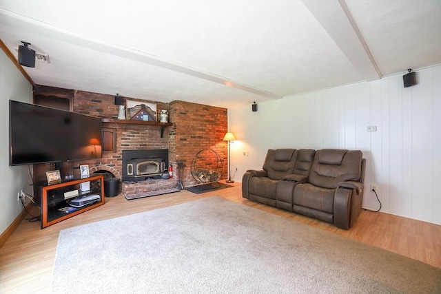 40 Old Stage Rd, Chelmsford, MA 01824 - living room featuring wood finished floors and a wood stove