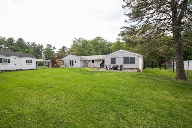 40 Old Stage Rd, Chelmsford, MA 01824 - rear view of property with view of wooded area
