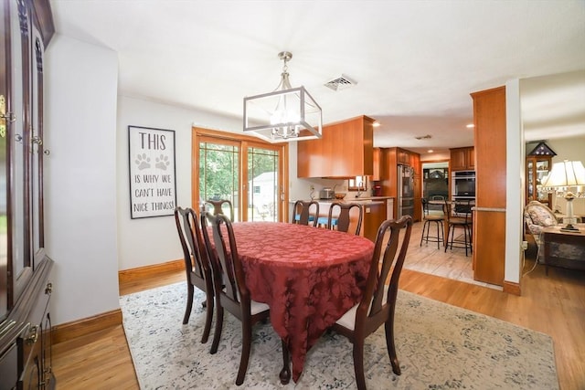40 Old Stage Rd, Chelmsford, MA 01824 - dining room featuring a chandelier, light wood finished floors, baseboards, and recessed lighting