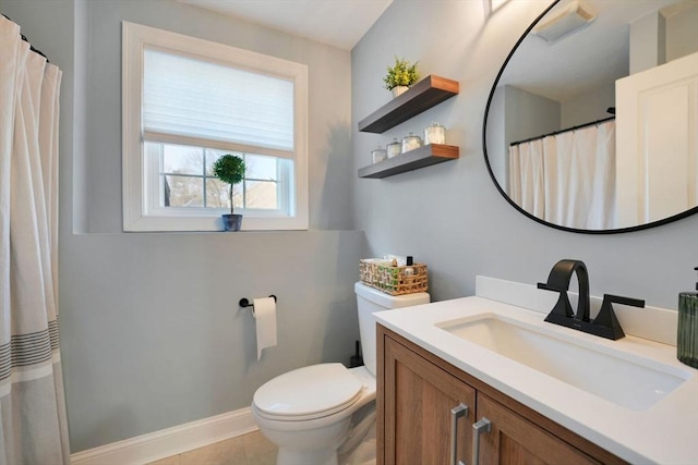 full bathroom with toilet, tile patterned flooring, vanity, and baseboards