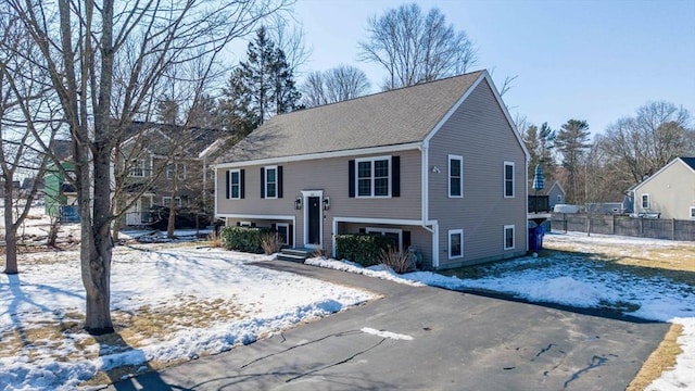 bi-level home with fence