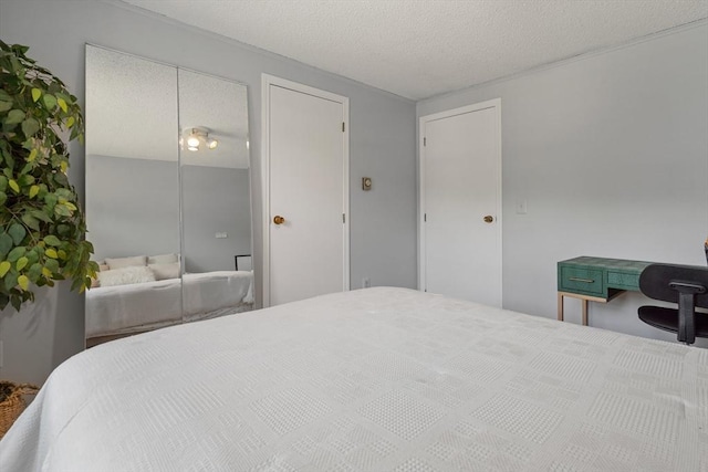 bedroom with a textured ceiling