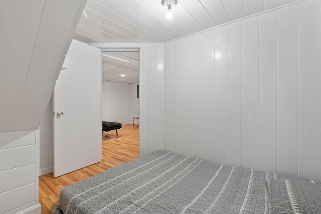 bedroom featuring wooden ceiling and wood finished floors