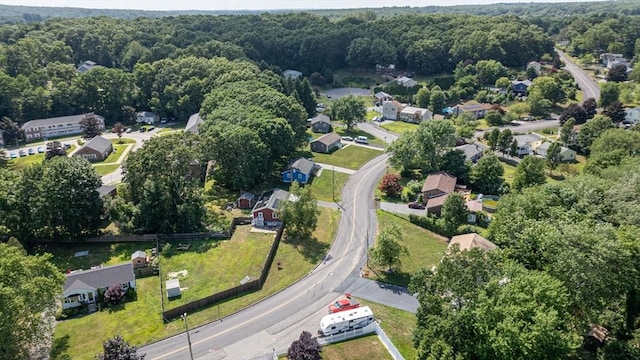 aerial view featuring a residential view and a view of trees