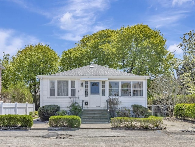 44 J St, Hull, MA 02045 - view of front facade with roof with shingles and entry steps