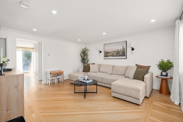 living room with hardwood / wood-style flooring and ornamental molding