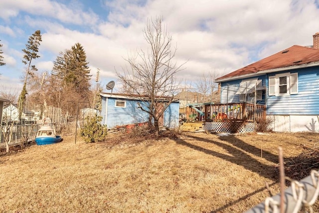 view of yard featuring a wooden deck