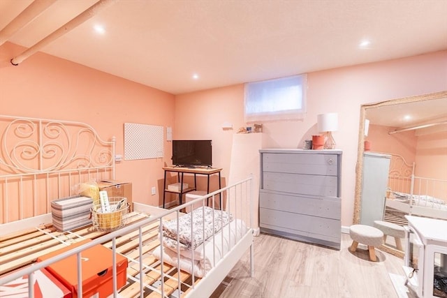 bedroom with light wood-type flooring