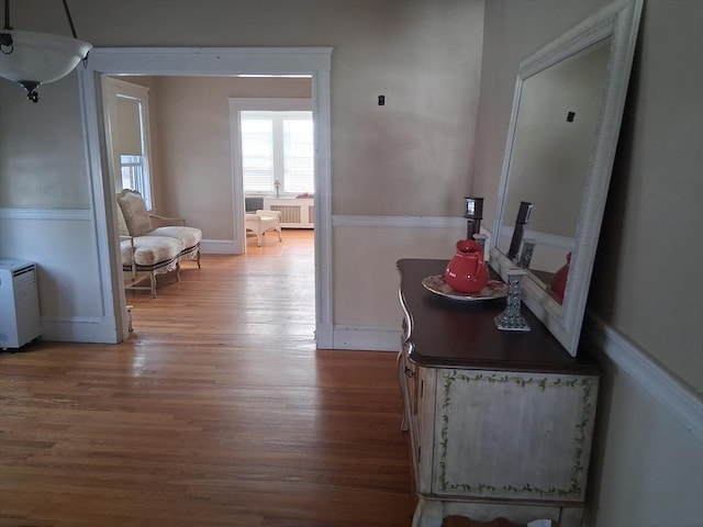 513 Washington Ave, Chelsea, MA 02150 - hall featuring radiator heating unit and wood finished floors