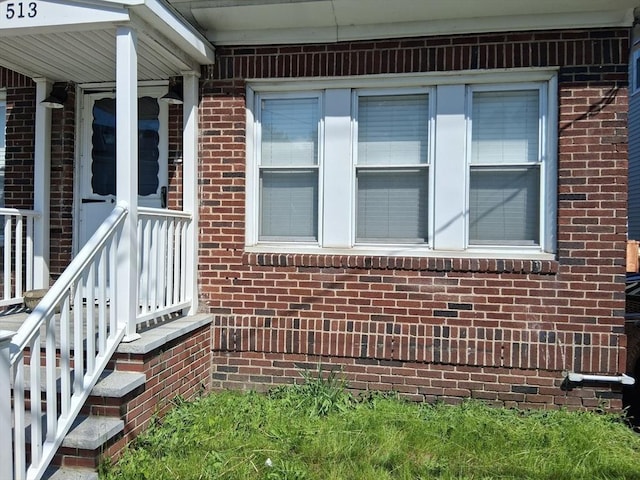513 Washington Ave, Chelsea, MA 02150 - property entrance with brick siding