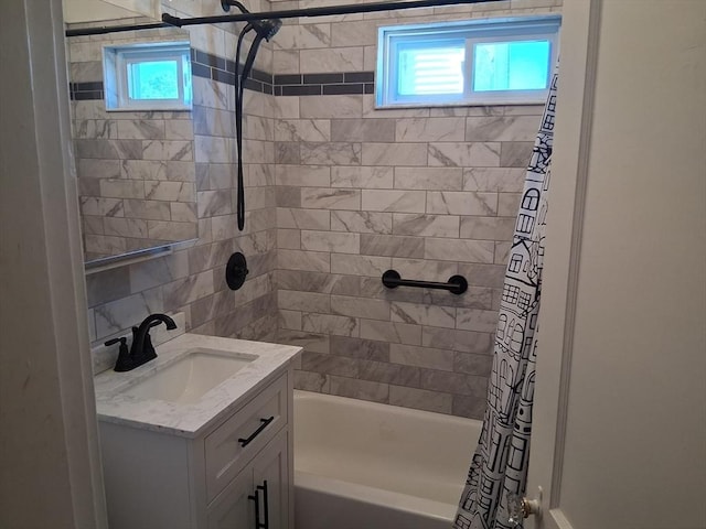 513 Washington Ave, Chelsea, MA 02150 - bathroom featuring plenty of natural light, vanity, and shower / tub combo with curtain