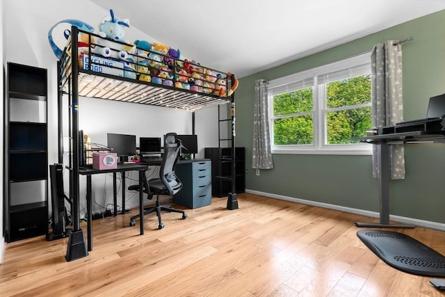 29 1st St Unit C, Salem, MA 01970 - bedroom with wood finished floors and a desk