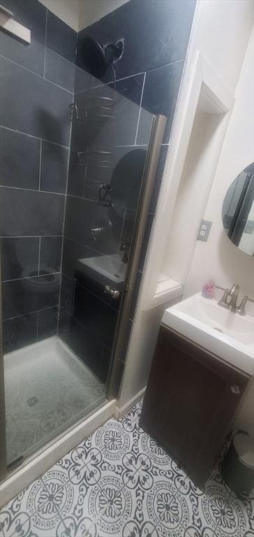 10 Monroe, Springfield, MA 01109 - full bath featuring a shower stall, vanity, and tile patterned flooring
