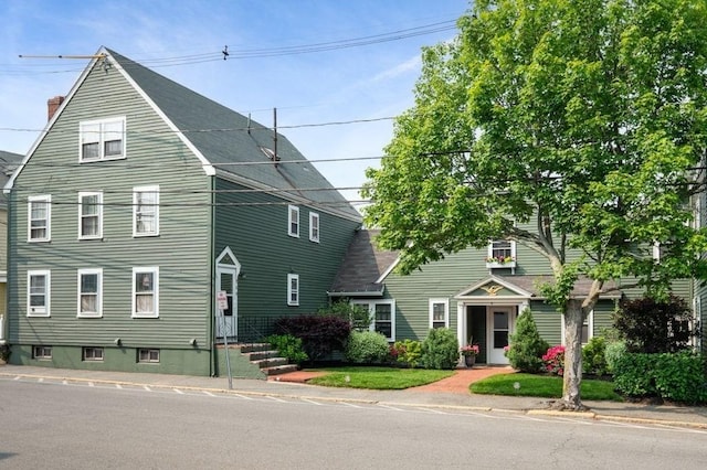 8 Franklin St Unit 18, Marblehead, MA 01945 - view of front facade with a chimney