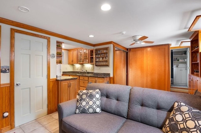 8 Franklin St Unit 18, Marblehead, MA 01945 - kitchen featuring open shelves, a sink, ceiling fan, glass insert cabinets, and brown cabinets