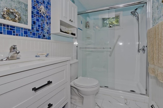 8 Field St, Southwick, MA 01077 - full bath featuring a shower stall, toilet, marble finish flooring, vanity, and a wainscoted wall