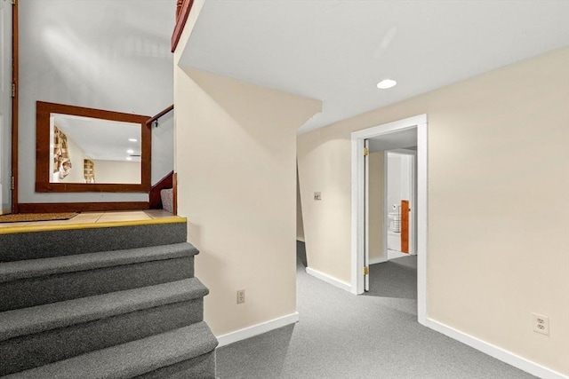 stairway with carpet, baseboards, and recessed lighting